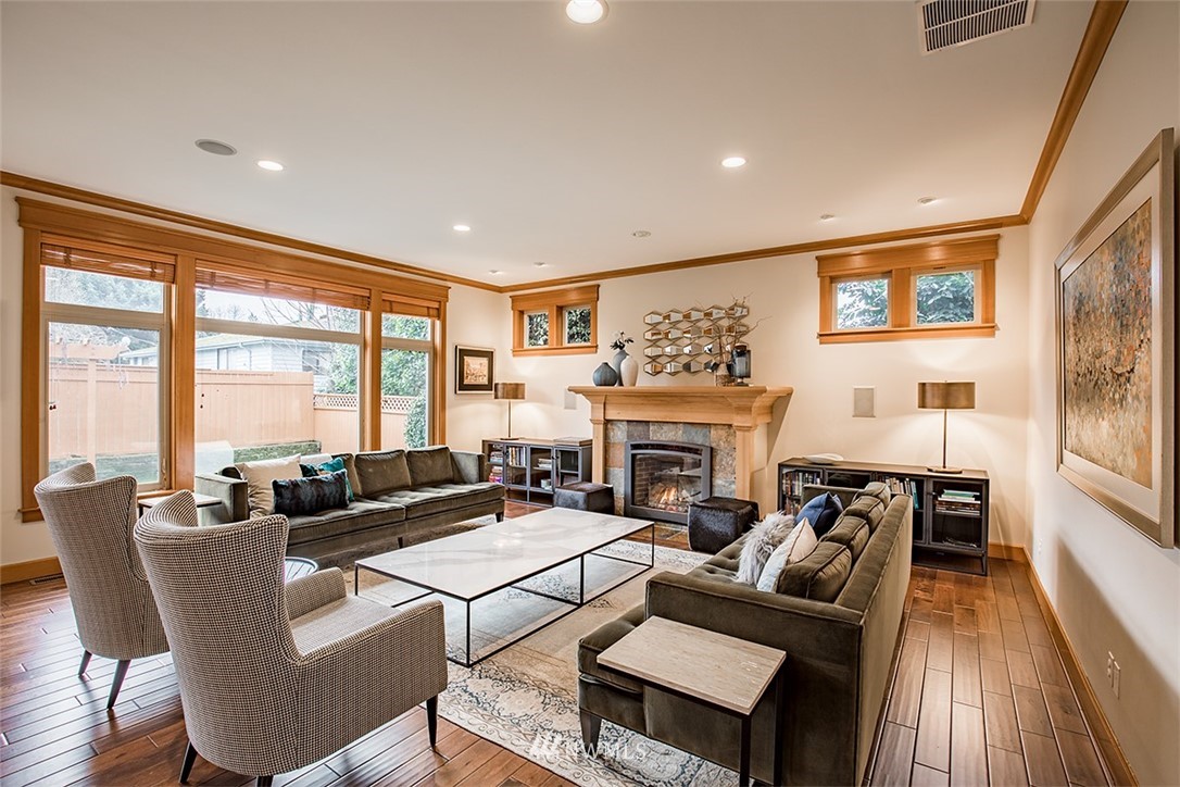 907 North 35th Street Renton, WA 98056 - Photo 11 of 37 a living room with fireplace furniture and a large window