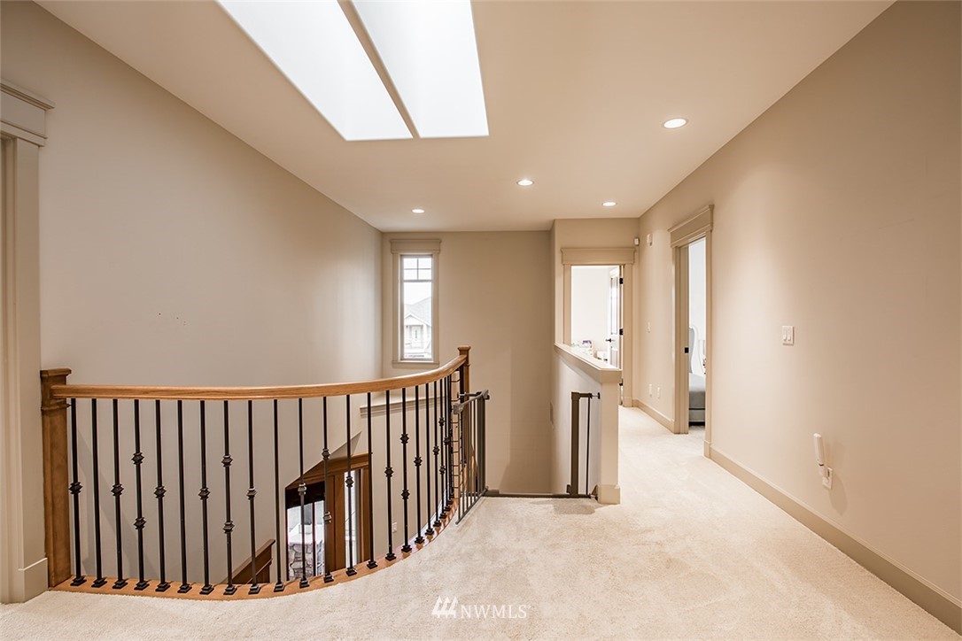 907 North 35th Street Renton, WA 98056 - Photo 22 of 37 a view of hallway with stairs
