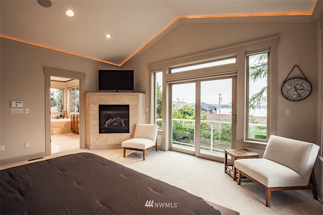 907 North 35th Street Renton, WA 98056 - Photo 25 of 37 a living room with furniture and a fireplace