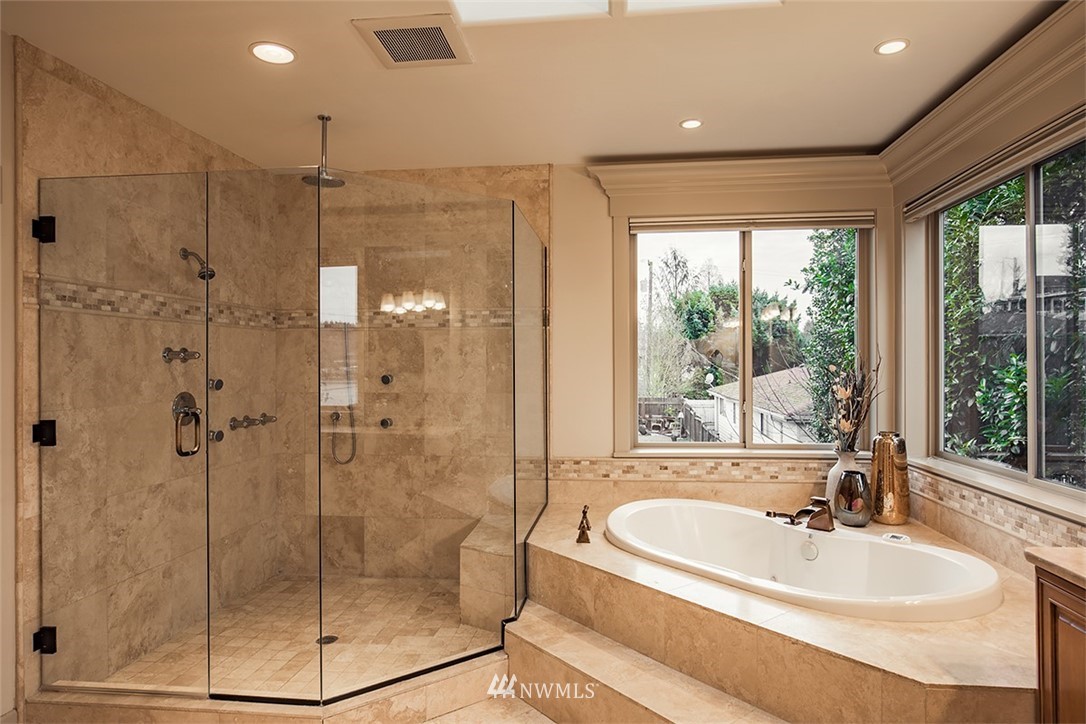 907 North 35th Street Renton, WA 98056 - Photo 27 of 37 a bathroom with a bathtub and a shower