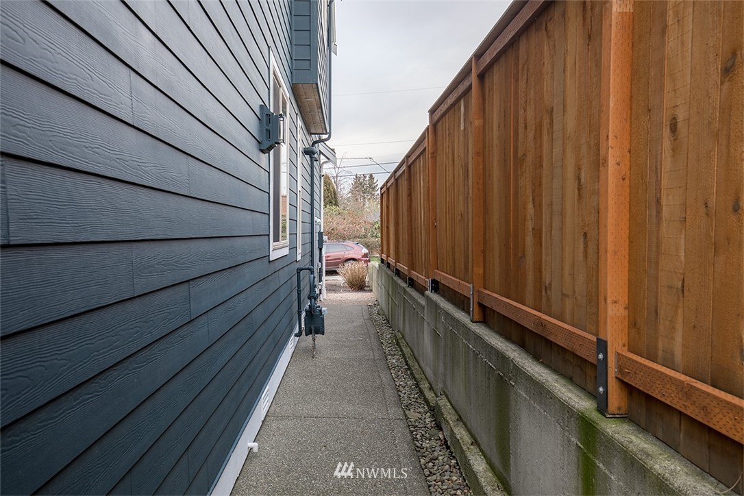 907 North 35th Street Renton, WA 98056 - Photo 37 of 37 a view of a balcony with wooden floor and stairs