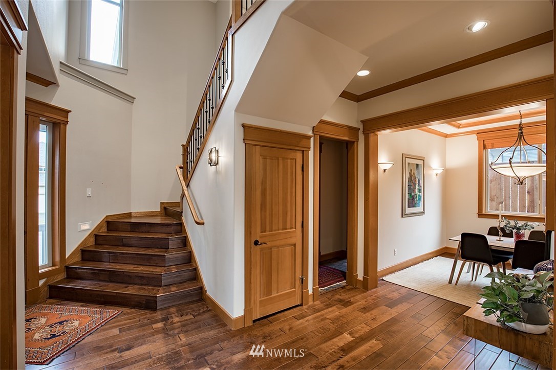 907 North 35th Street Renton, WA 98056 - Photo 7 of 37 a view of an entryway with wooden floor and windows