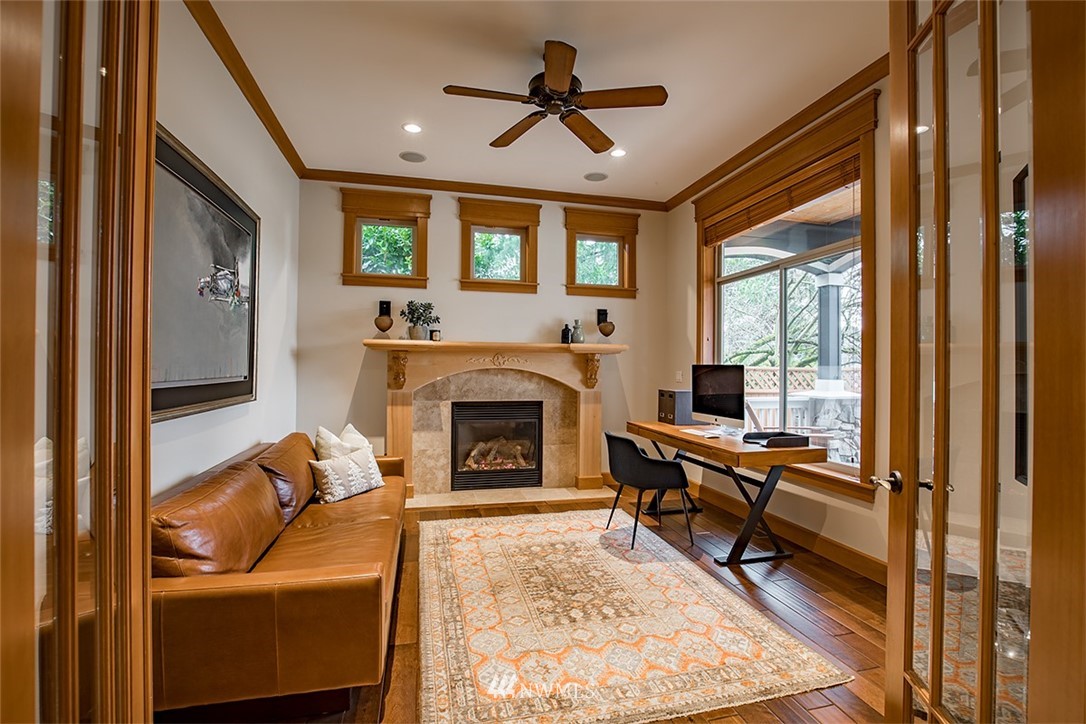 907 North 35th Street Renton, WA 98056 - Photo 9 of 37 a living room with furniture and a fireplace