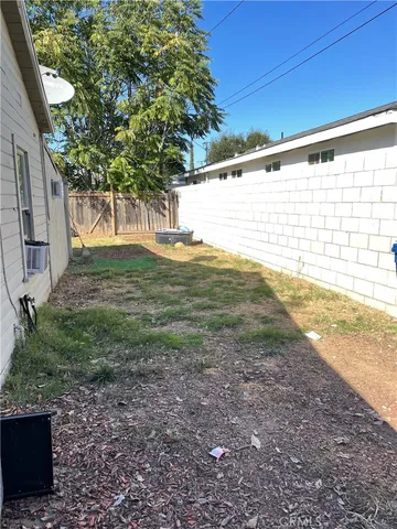 a view of a yard with an outdoor space