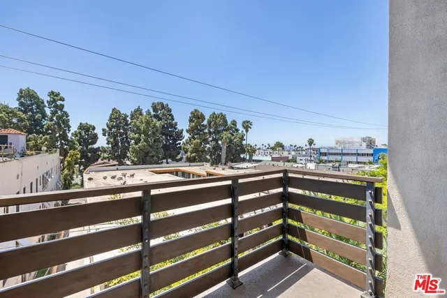 a view of a street with sitting area