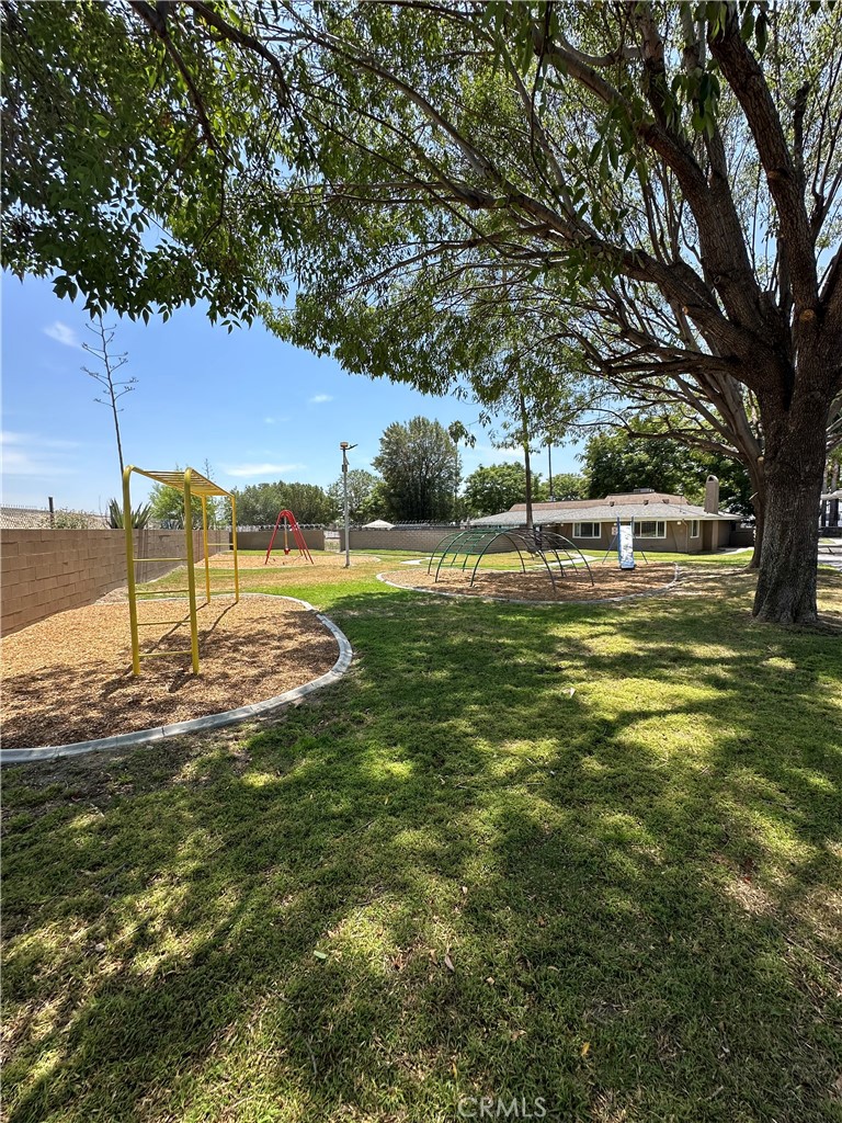 3825 Crestmore Road, Unit 414 Riverside, CA 92509 - Photo 30 of 31 a view of an outdoor space and swimming pool