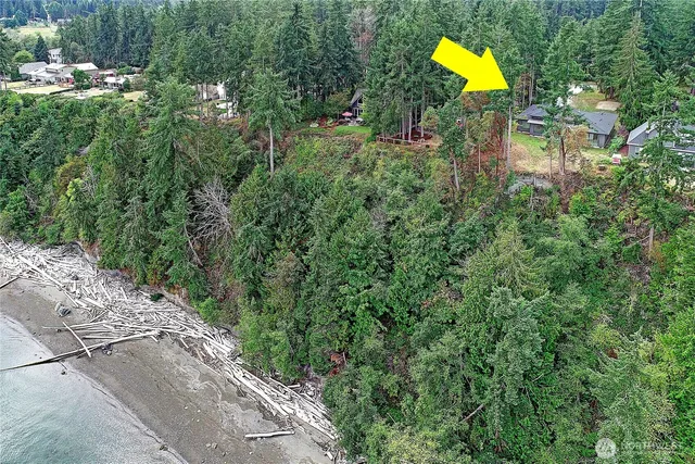 a view of a house with a yard and garage