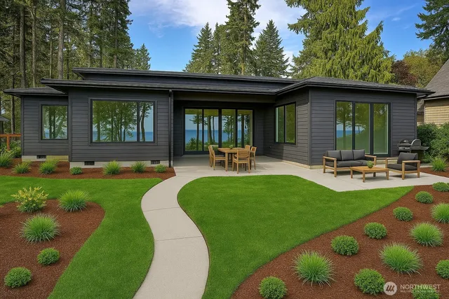 a house view with swimming pool and garden space