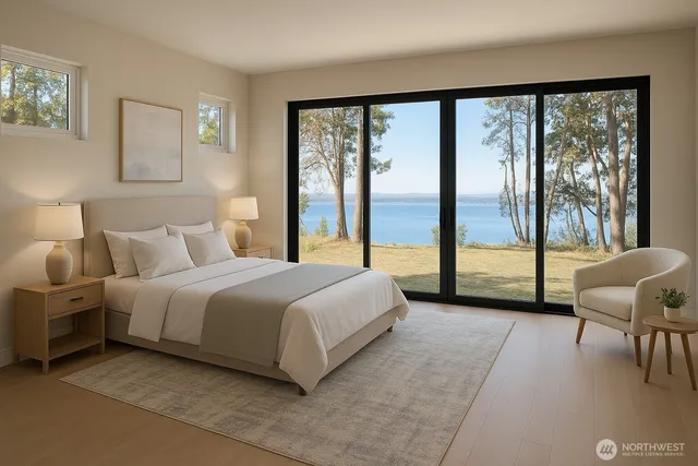 a spacious bedroom with a large bed and a large window