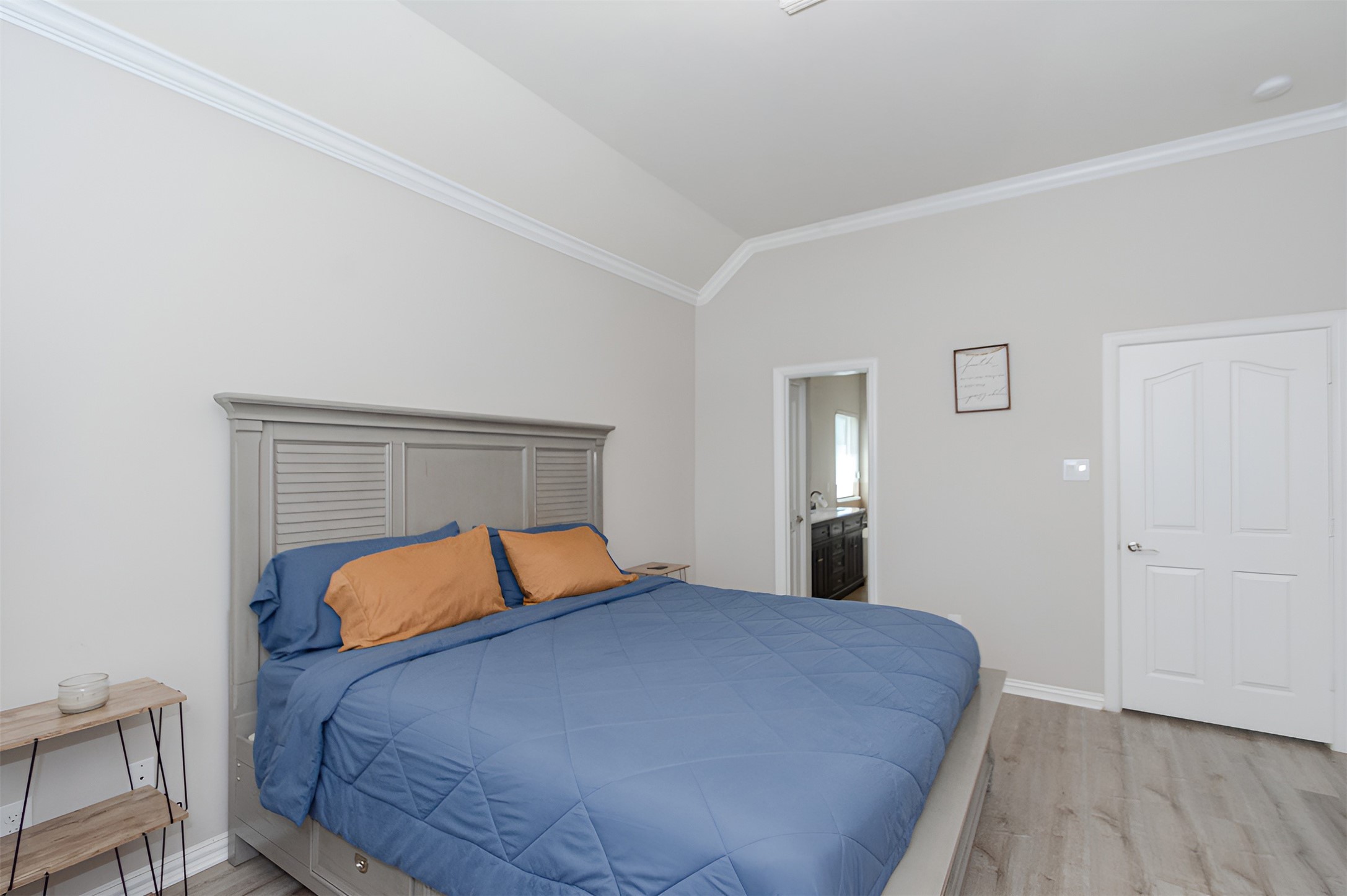 4907 Applewood Crest Lane Rosharon, TX 77583 - Photo 18 of 36 a bedroom with a bed and wooden floor