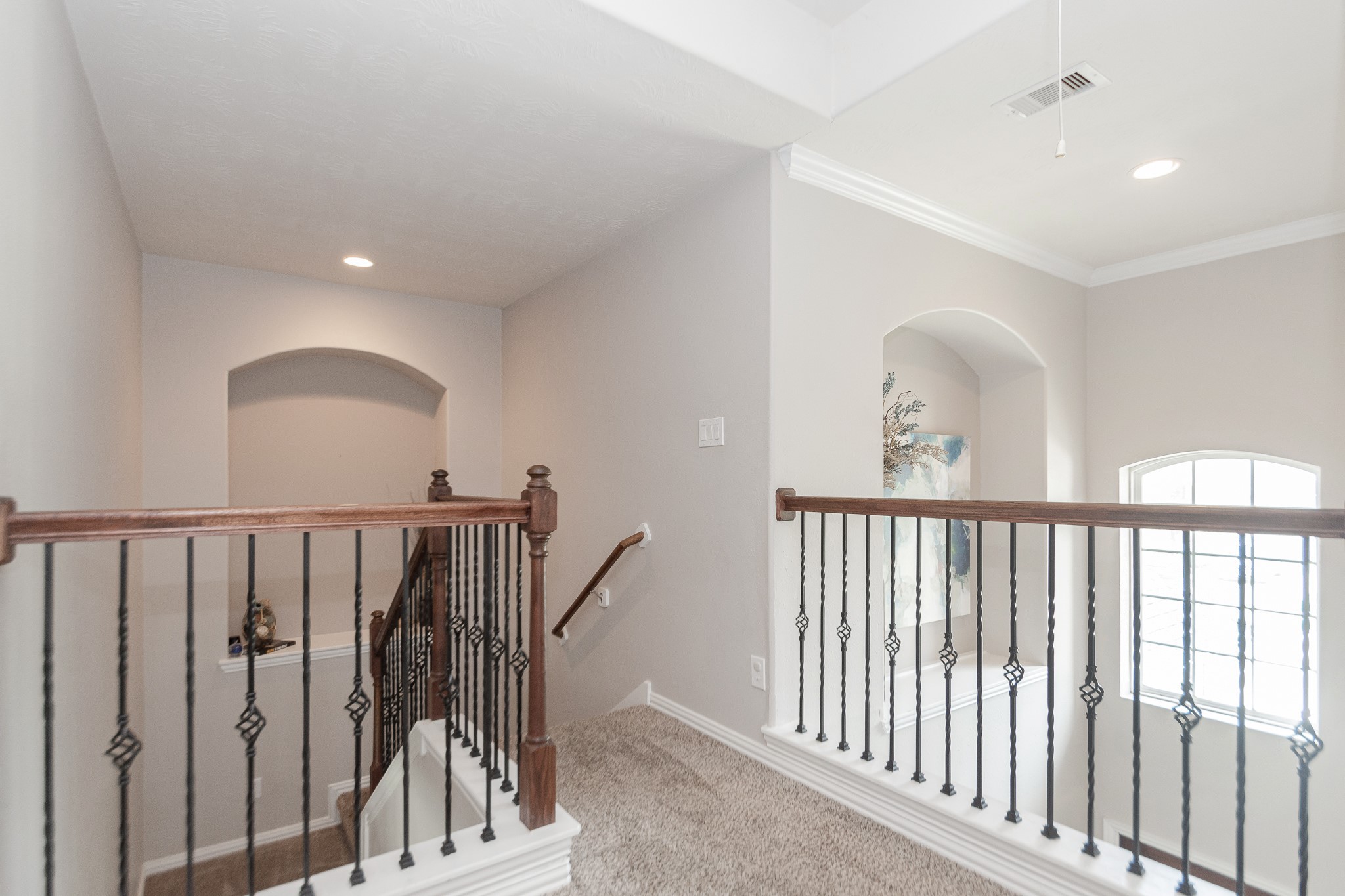 4907 Applewood Crest Lane Rosharon, TX 77583 - Photo 24 of 36 a view of staircase with railing and a chandelier