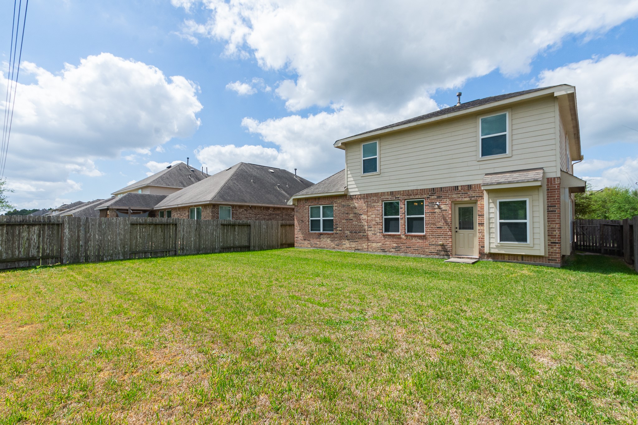 4907 Applewood Crest Lane Rosharon, TX 77583 - Photo 34 of 36 a view of a house with a yard and large tree