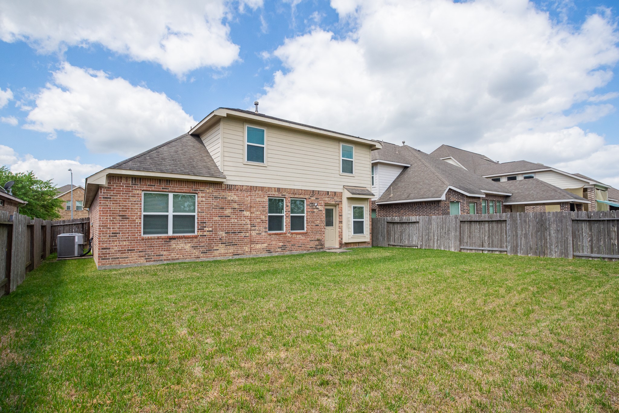 4907 Applewood Crest Lane Rosharon, TX 77583 - Photo 36 of 36 a view of a yard in front of a house with large trees