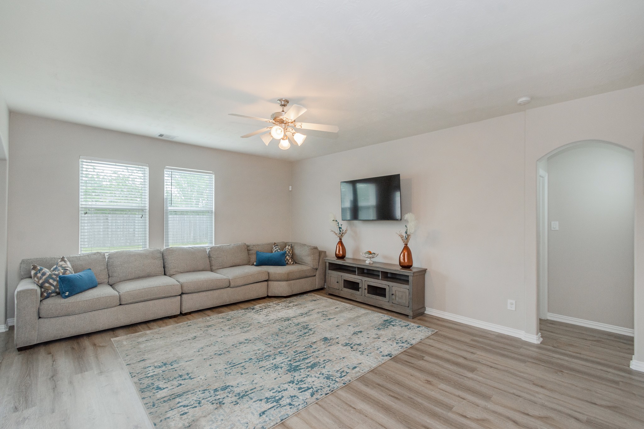 4907 Applewood Crest Lane Rosharon, TX 77583 - Photo 4 of 36 a living room with furniture and a flat screen tv