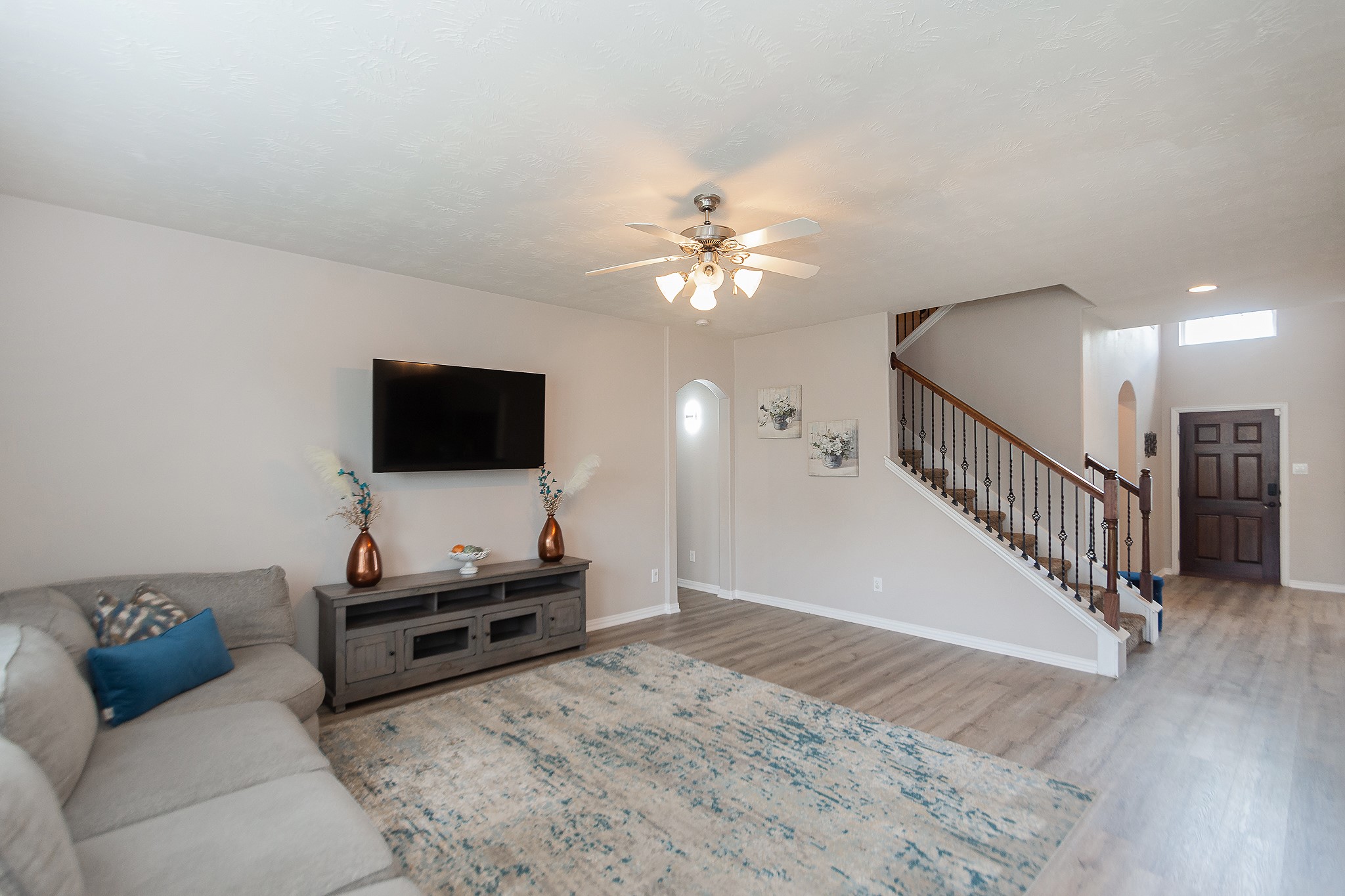 4907 Applewood Crest Lane Rosharon, TX 77583 - Photo 6 of 36 a living room with furniture and a flat screen tv