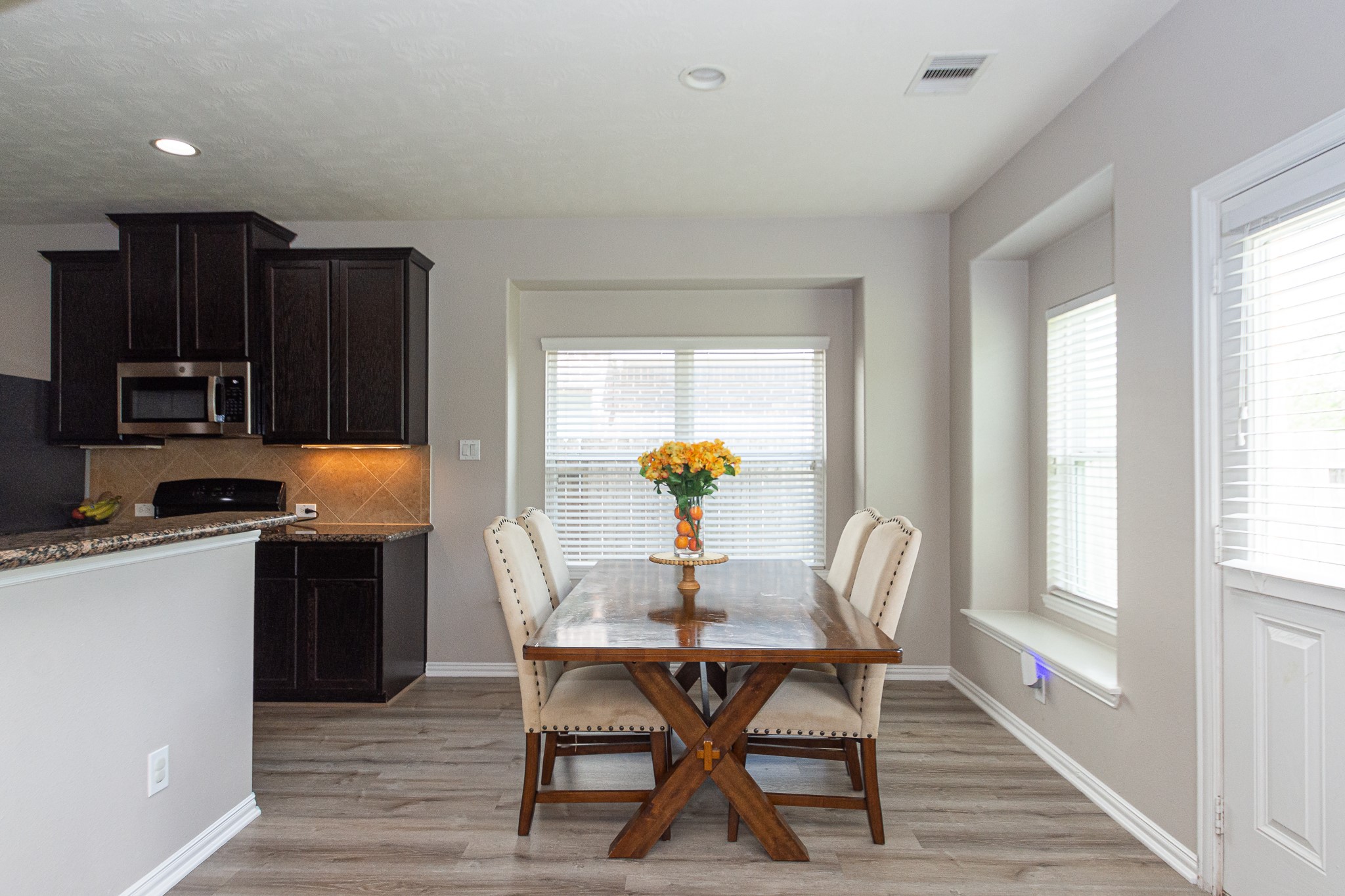 4907 Applewood Crest Lane Rosharon, TX 77583 - Photo 7 of 36 a dining room with furniture and window