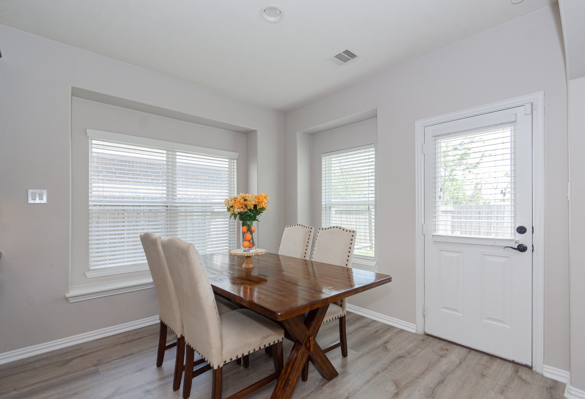 4907 Applewood Crest Lane Rosharon, TX 77583 - Photo 8 of 36 a view of a dining room with furniture and wooden floor