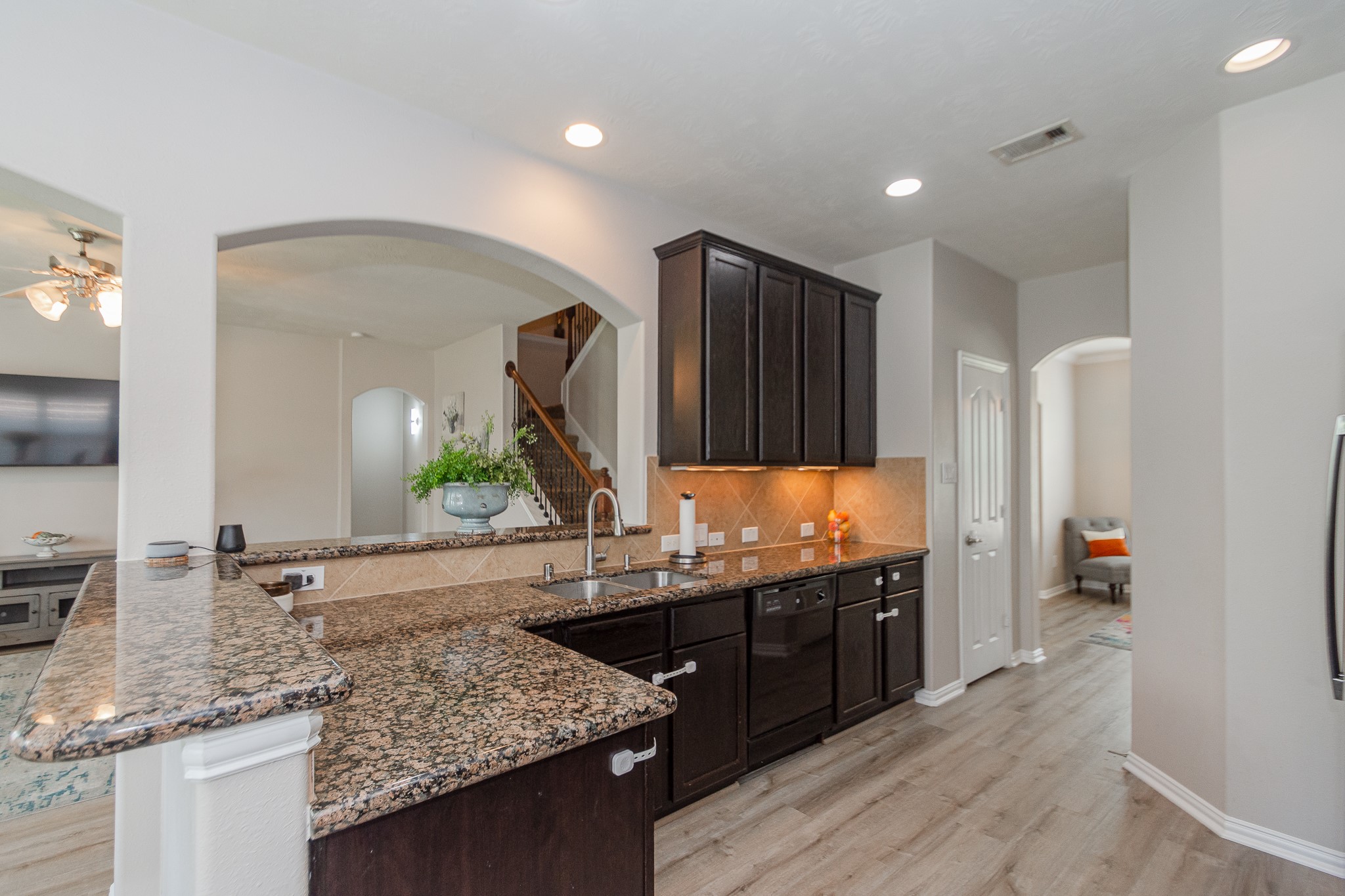 4907 Applewood Crest Lane Rosharon, TX 77583 - Photo 10 of 36 a bathroom with a granite countertop sink and a mirror