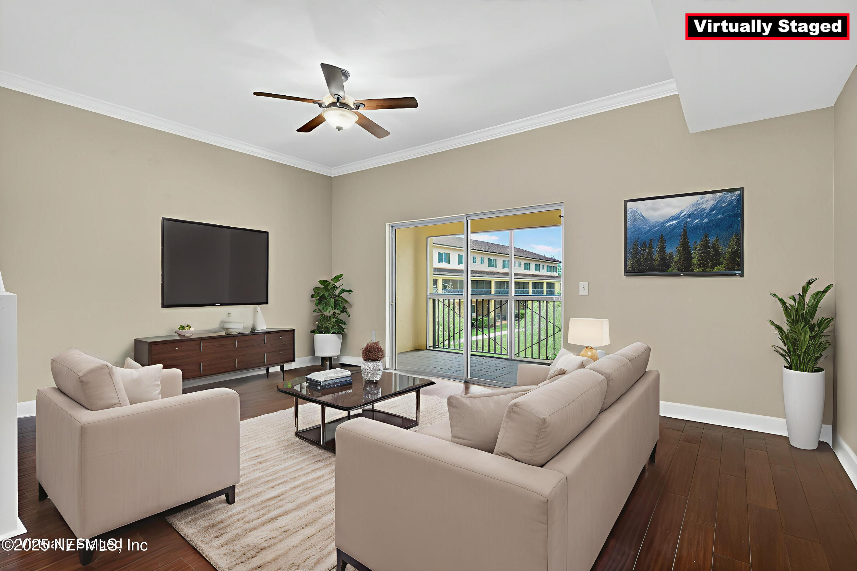 9745 Touchton Road, Unit 1625 Jacksonville, FL 32246 - Photo 12 of 69 a living room with furniture floor to ceiling window and a flat screen tv