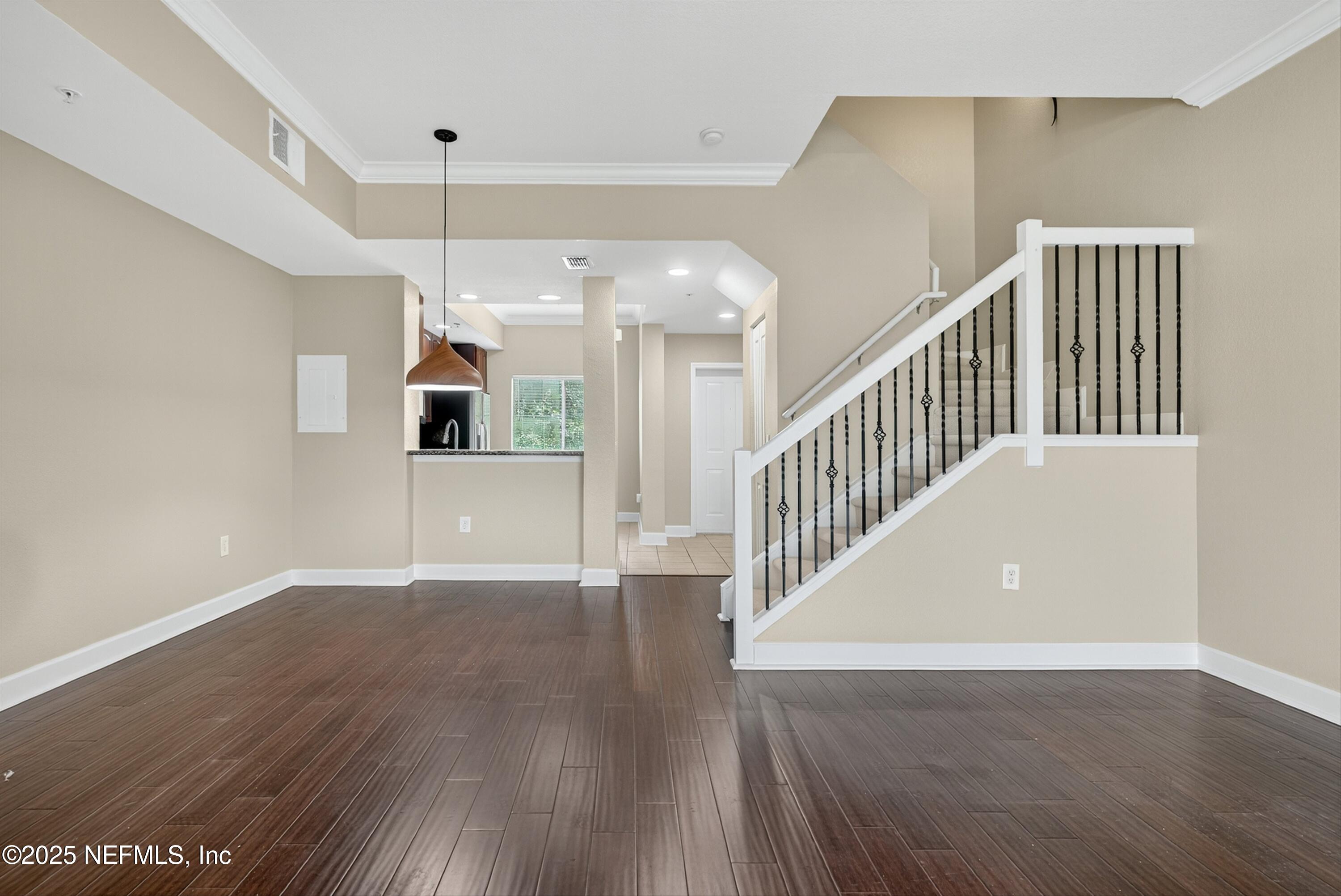 9745 Touchton Road, Unit 1625 Jacksonville, FL 32246 - Photo 15 of 69 a view of an entryway with wooden floor