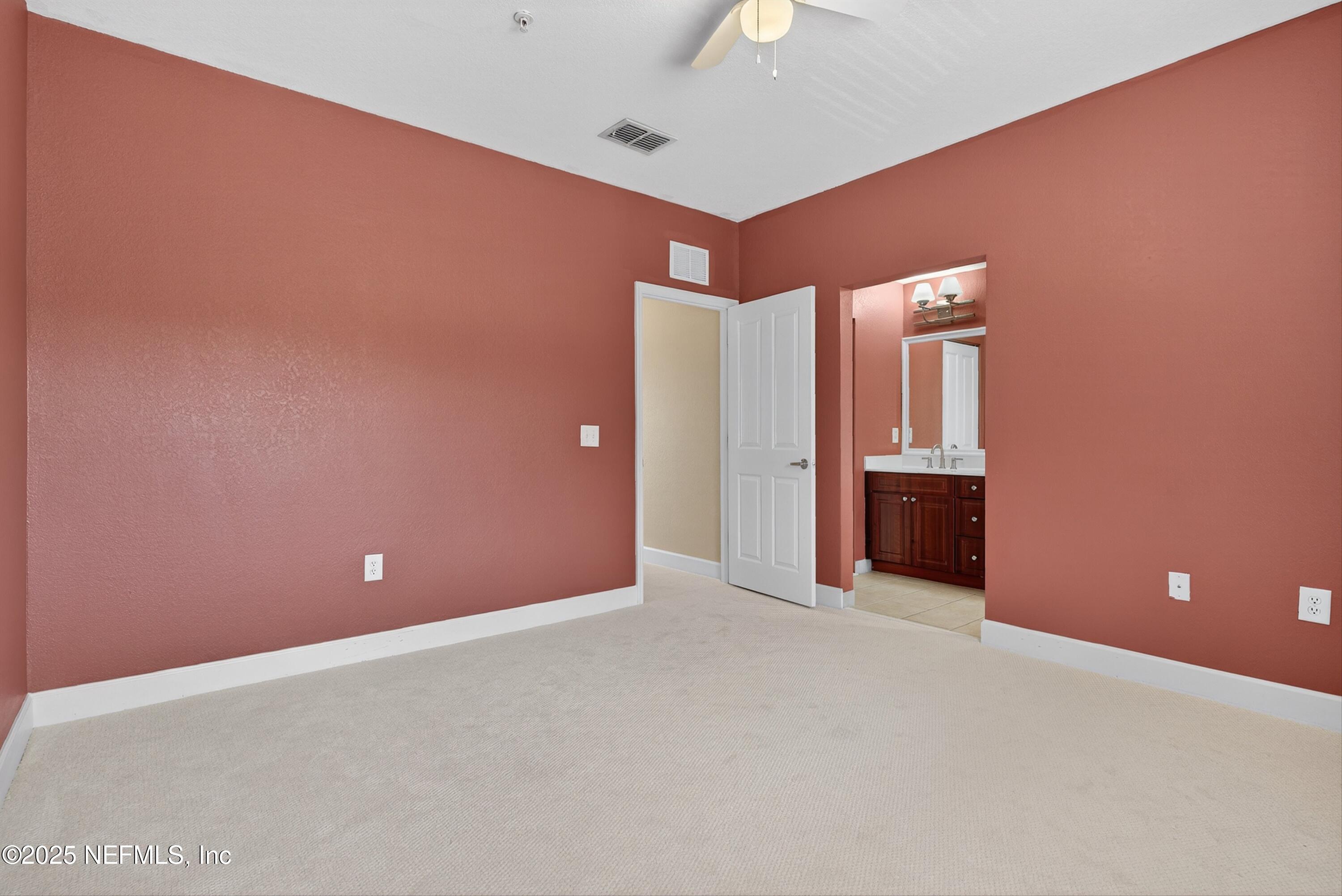 9745 Touchton Road, Unit 1625 Jacksonville, FL 32246 - Photo 34 of 69 a view of an empty room with a kitchen