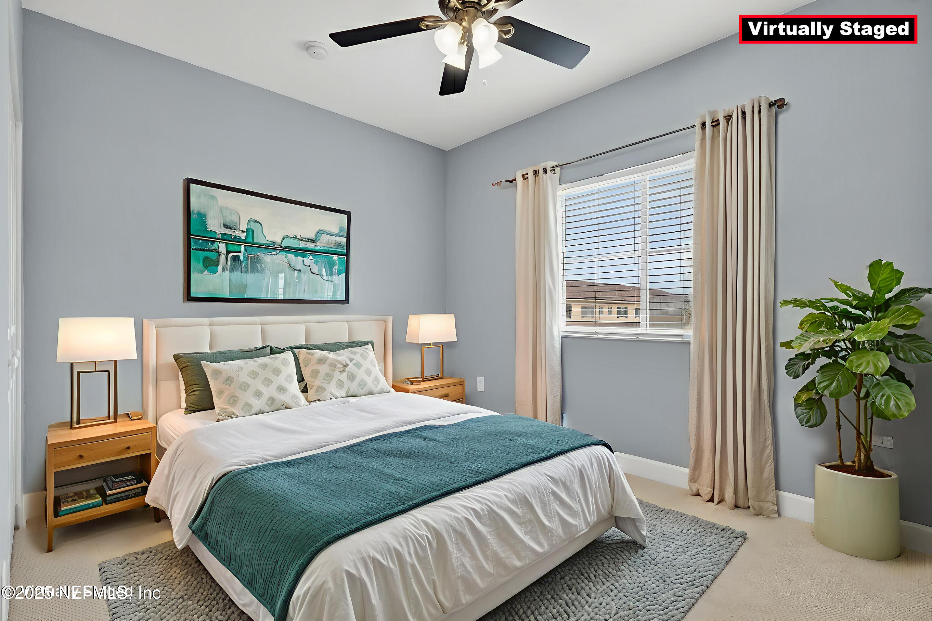 9745 Touchton Road, Unit 1625 Jacksonville, FL 32246 - Photo 44 of 69 a bedroom with a large bed and a potted plant