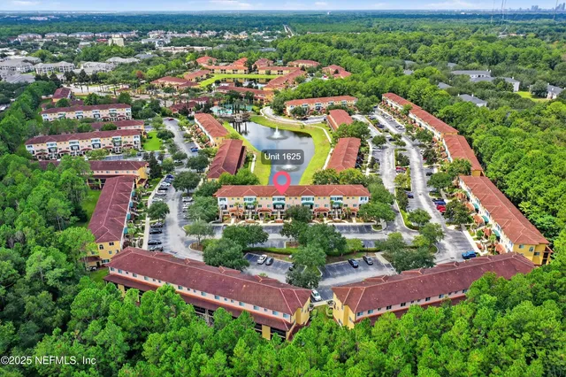 a view of a building with a street