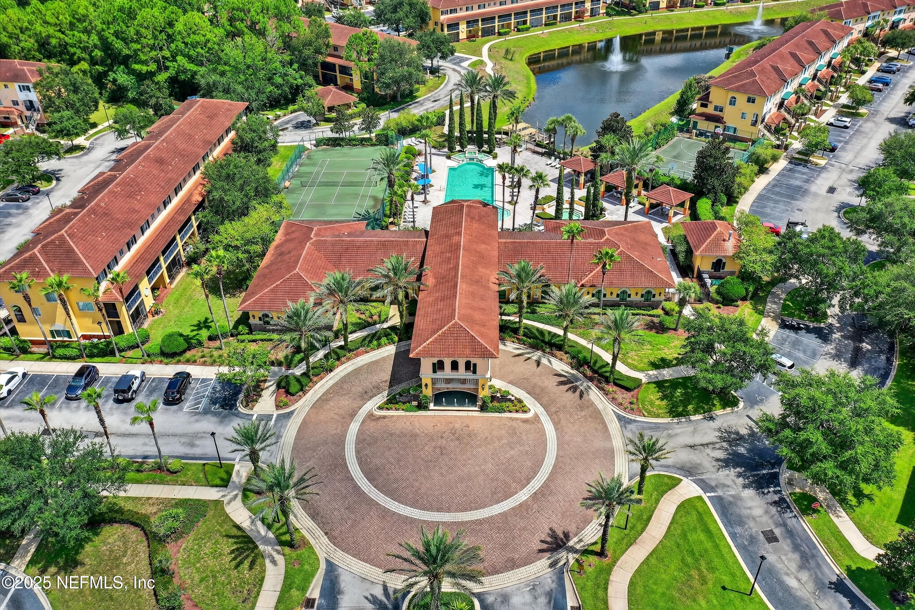 9745 Touchton Road, Unit 1625 Jacksonville, FL 32246 - Photo 54 of 69 a aerial view of a house with a yard and lake view