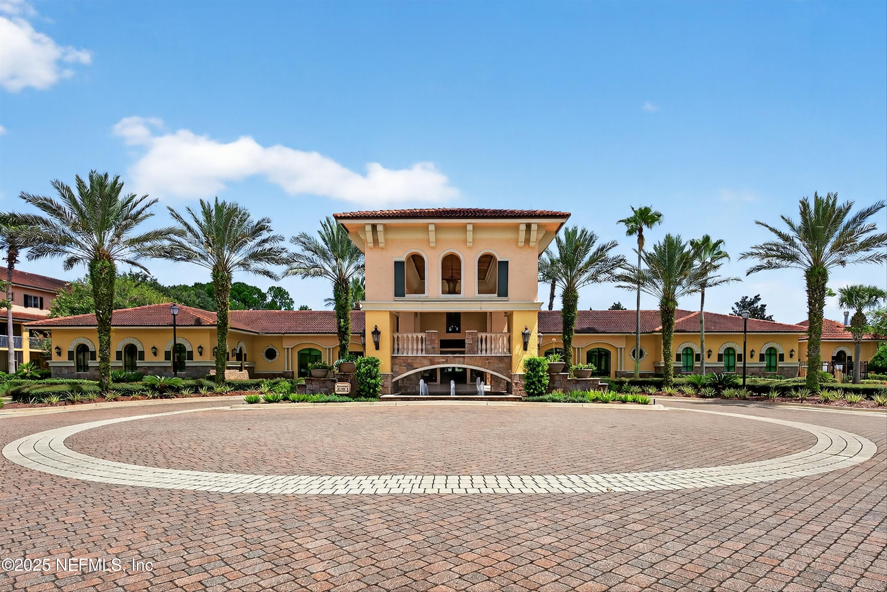 9745 Touchton Road, Unit 1625 Jacksonville, FL 32246 - Photo 56 of 69 a front view of multi story residential apartment building with yard and sign board
