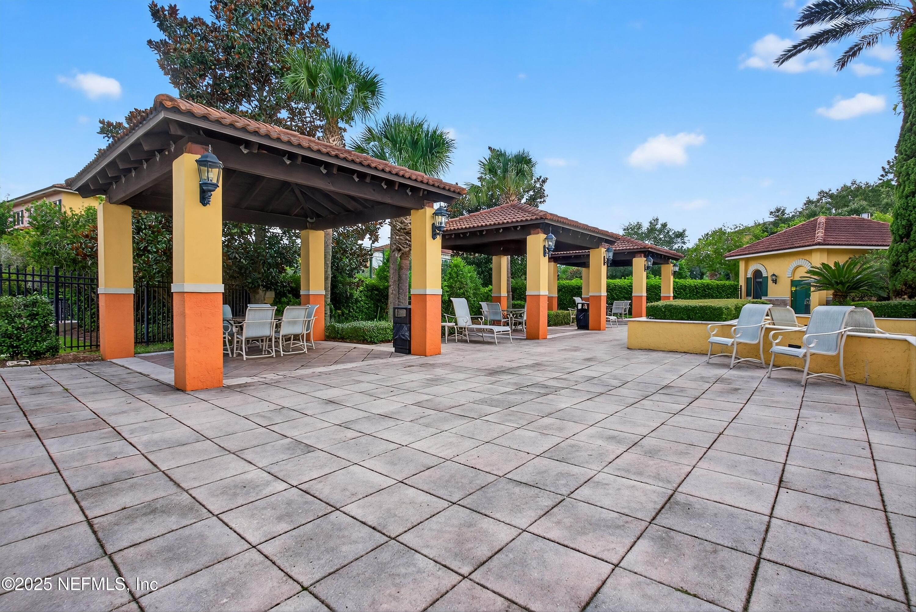 9745 Touchton Road, Unit 1625 Jacksonville, FL 32246 - Photo 64 of 69 a view of a house with backyard porch and sitting area