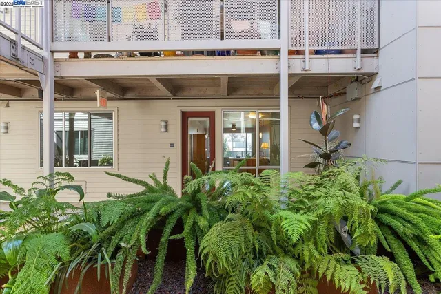 a view of a building with a garden