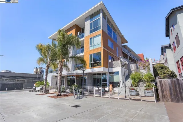 a view of a building with sitting area
