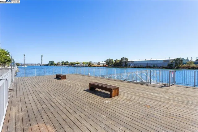 a view of swimming pool with outdoor seating and yard