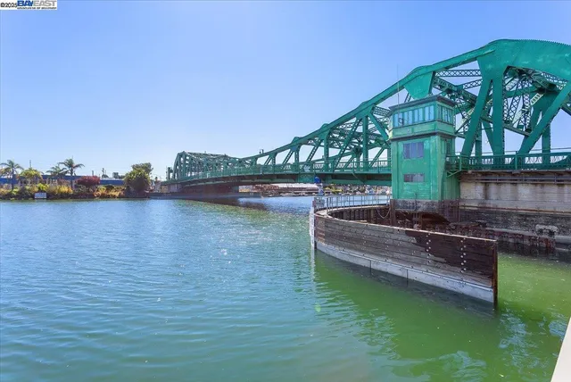an aerial view of a house with a lake view