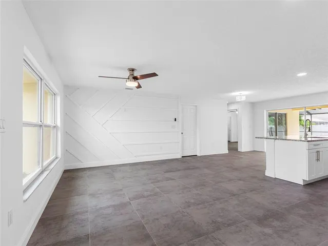 a view of kitchen with window and outdoor space