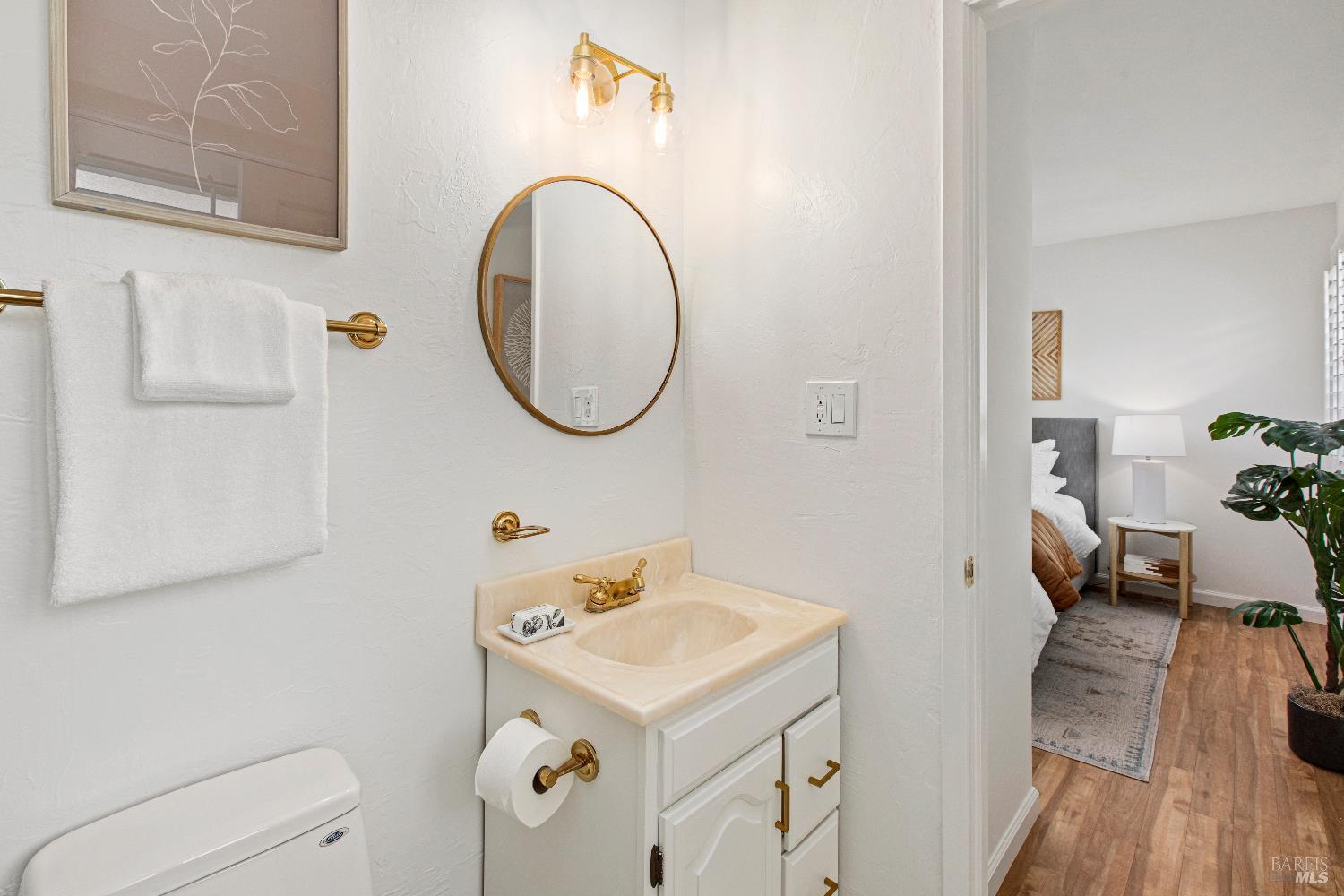 145 Irwin Street San Rafael, CA 94901 - Photo 26 of 48 a bathroom with a sink and a mirror