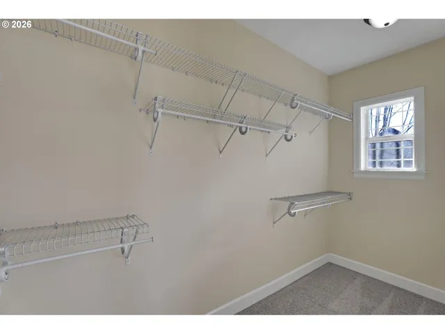 a view of a room with racks on the wall