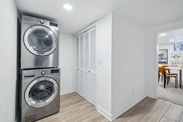a view of a hallway with washer and dryer