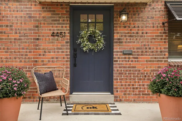 a view of a door with a potted plant