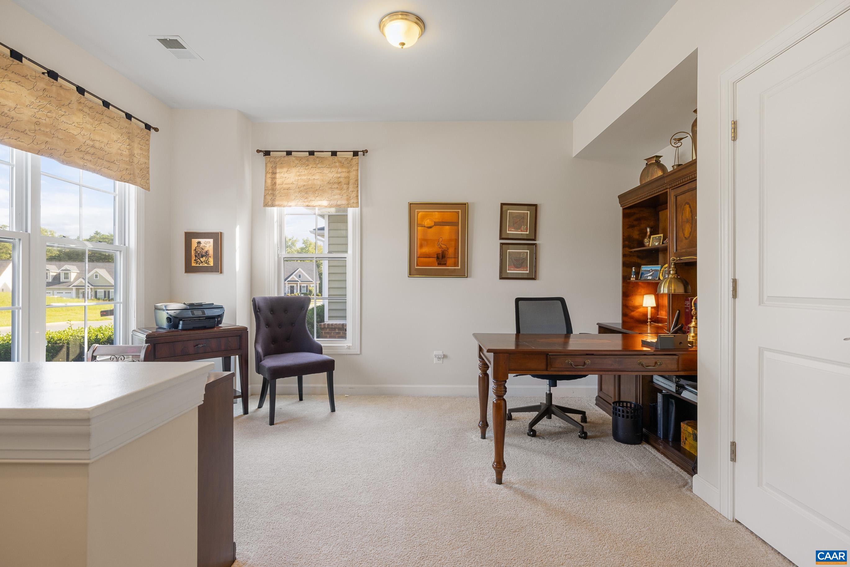 72 Spruce Drive Palmyra, VA 22963 - Photo 11 of 42 a view of a workspace with lounge chair and a window