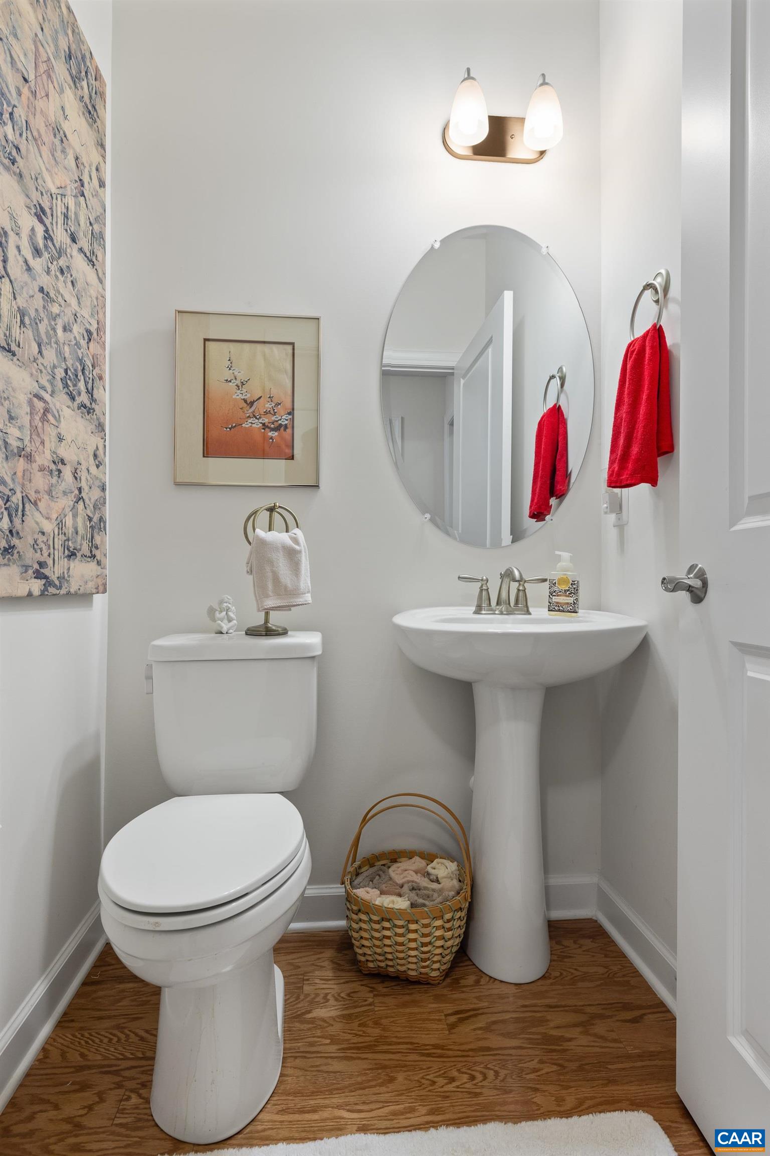 72 Spruce Drive Palmyra, VA 22963 - Photo 15 of 42 a bathroom with a toilet sink and mirror