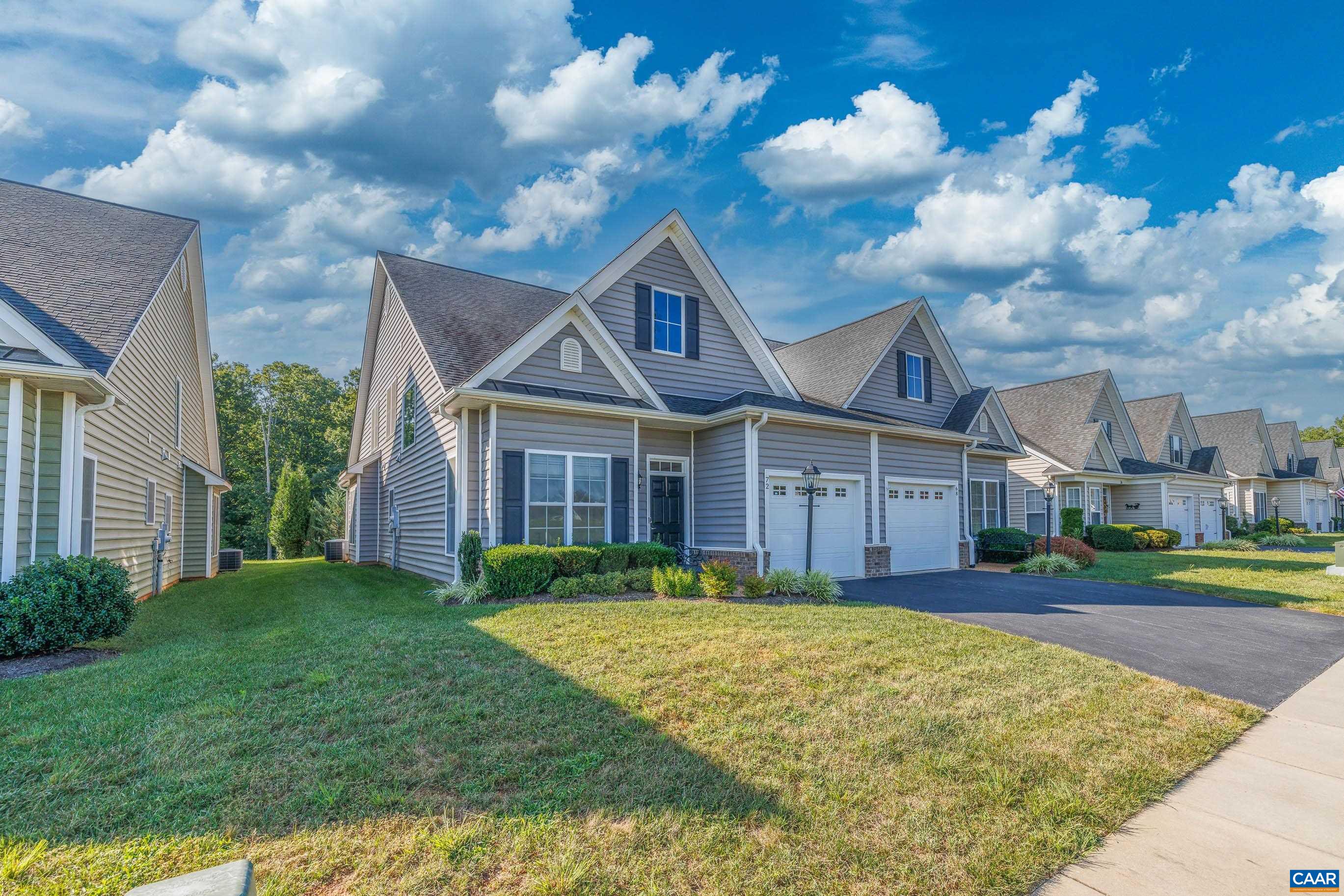 72 Spruce Drive Palmyra, VA 22963 - Photo 2 of 42 a front view of a house with a yard