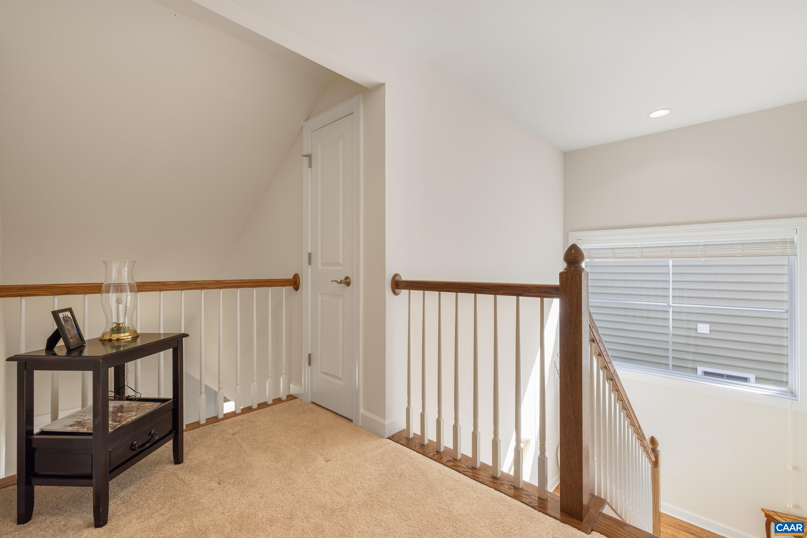 72 Spruce Drive Palmyra, VA 22963 - Photo 33 of 42 a view of a hallway to a livingroom with furniture and window
