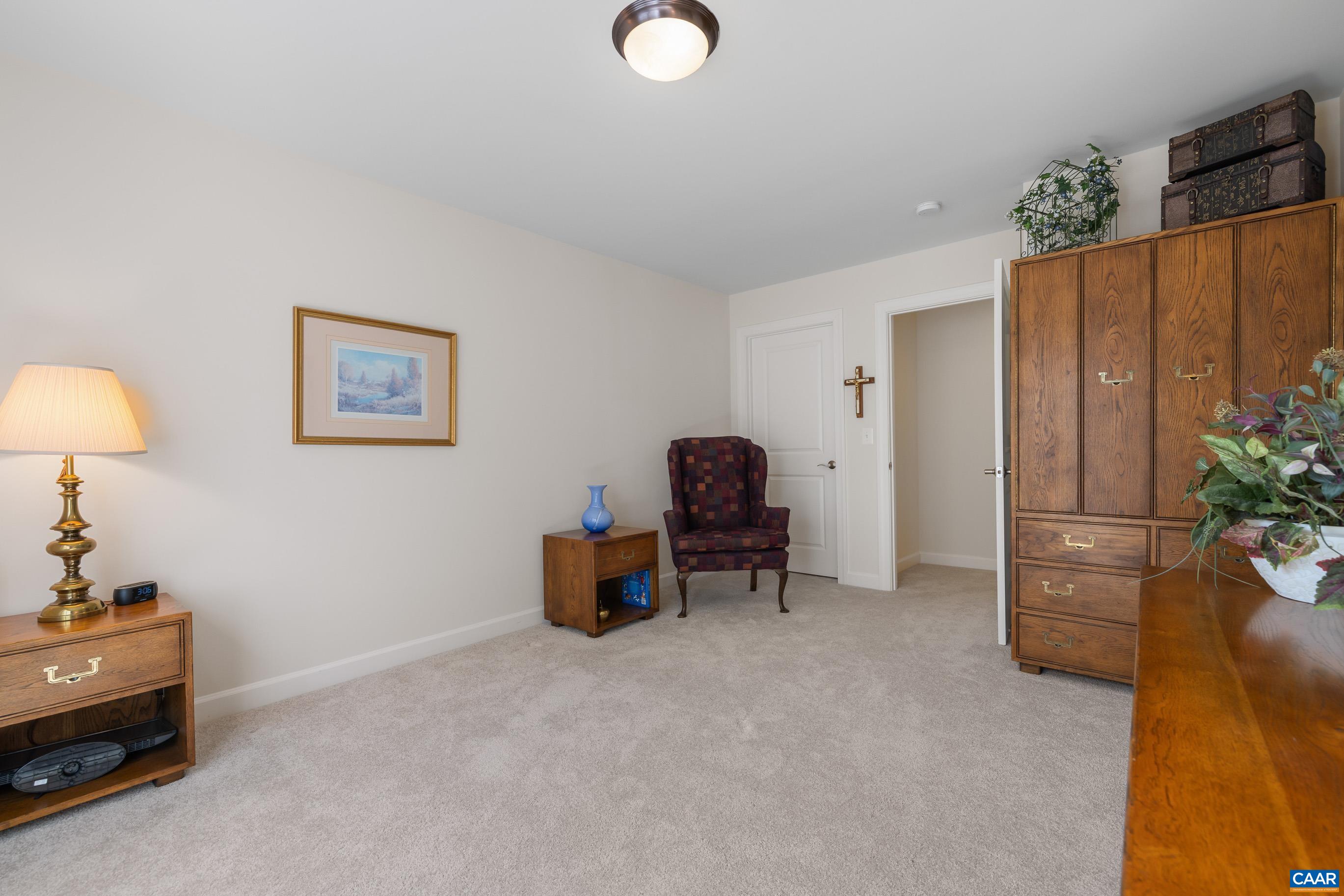 72 Spruce Drive Palmyra, VA 22963 - Photo 39 of 42 a view of a workspace with furniture and a lamp