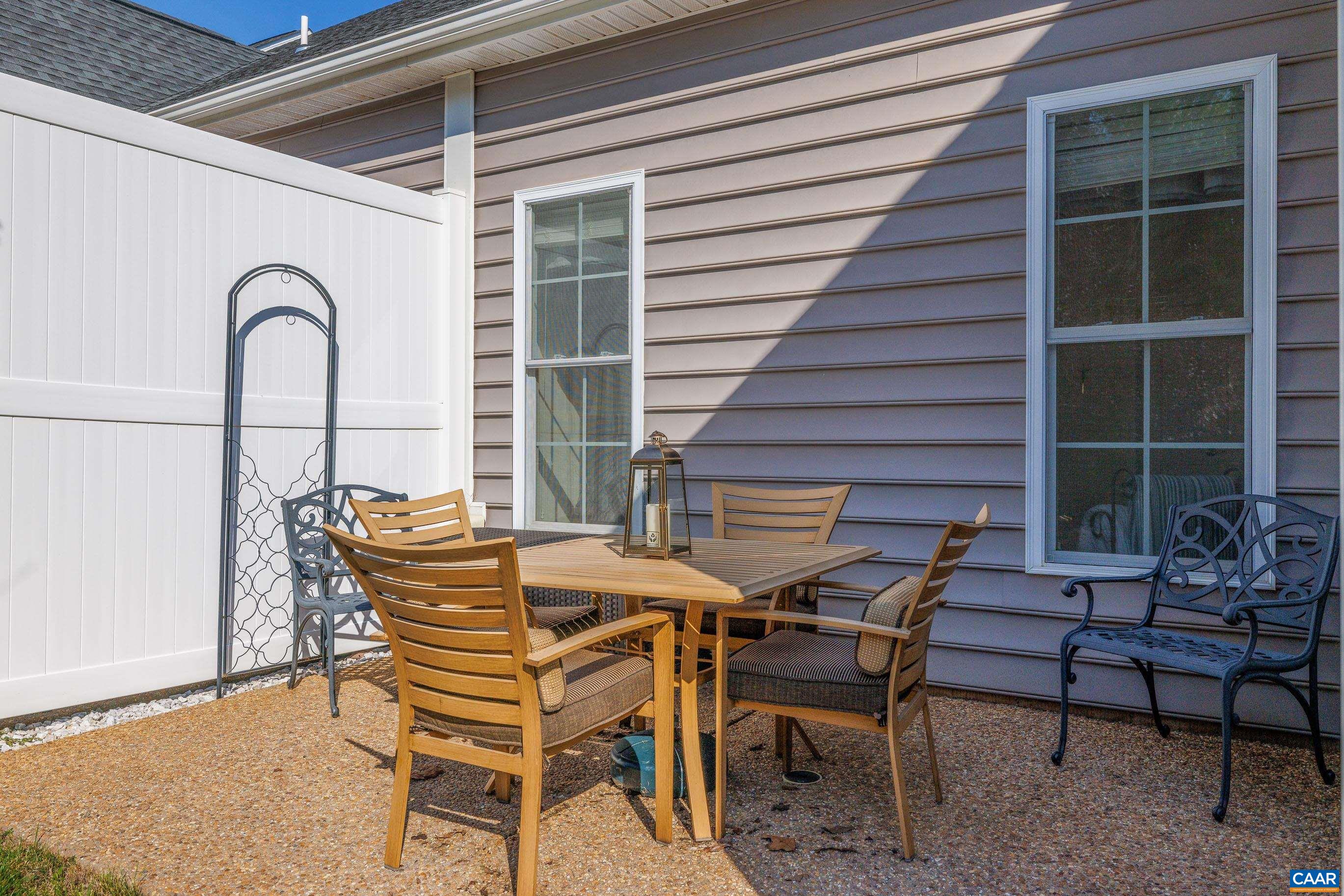 72 Spruce Drive Palmyra, VA 22963 - Photo 6 of 42 a patio with a table and chairs