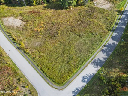 a view of a large swimming pool from a balcony
