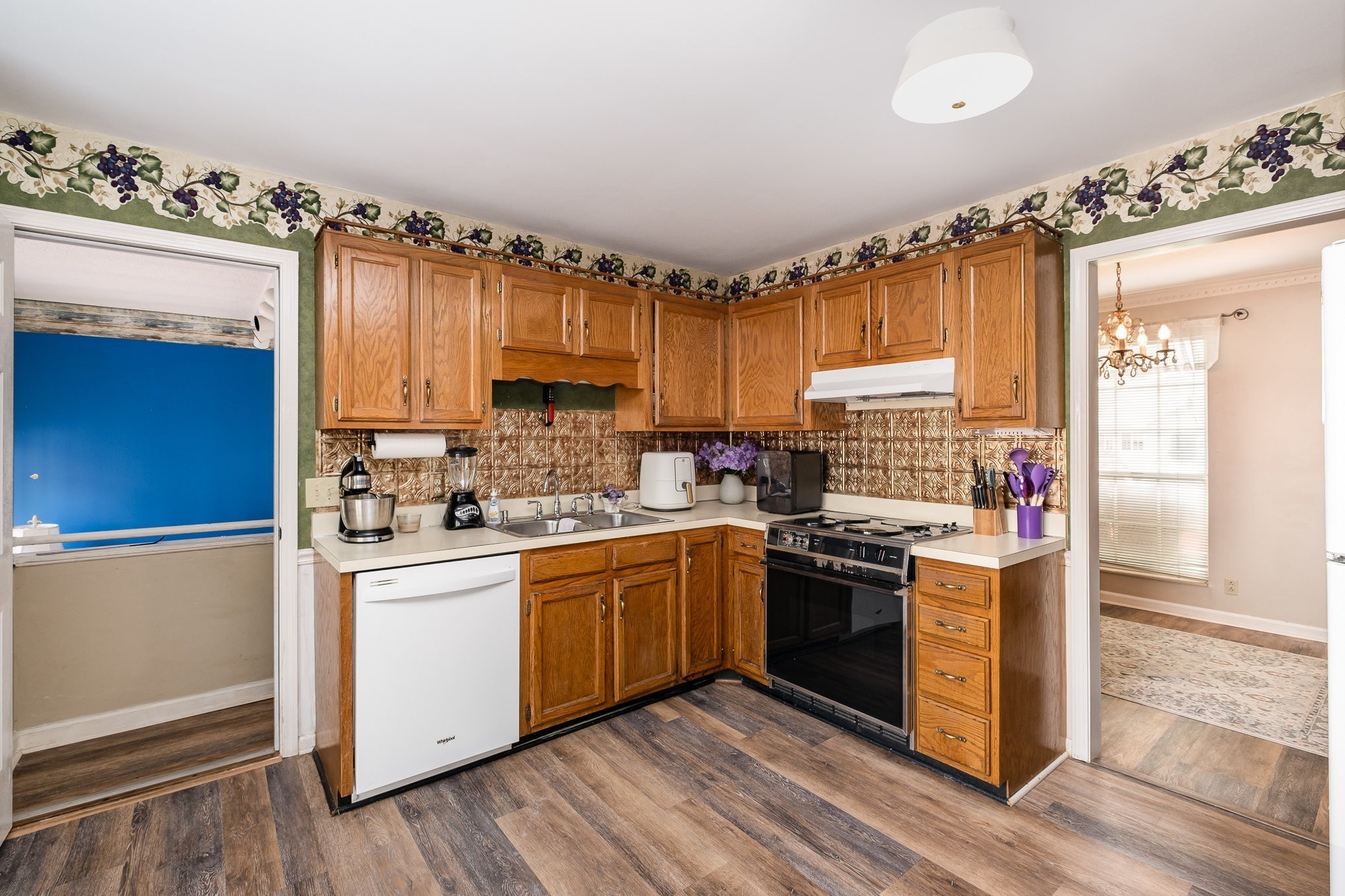 1113 Jacksons Valley Road Hermitage, TN 37076 - Photo 11 of 26 a kitchen with a sink stove and cabinets