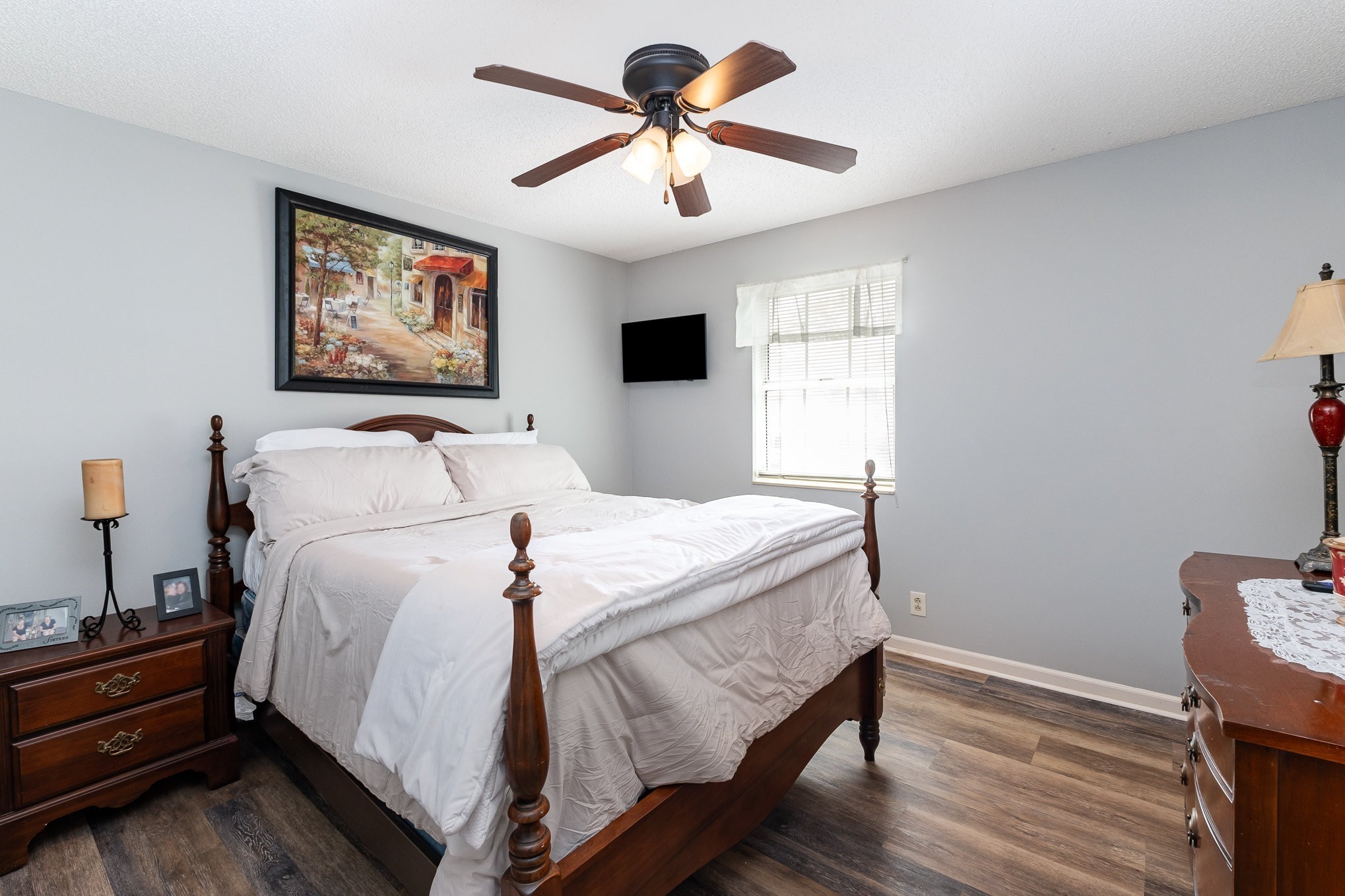 1113 Jacksons Valley Road Hermitage, TN 37076 - Photo 15 of 26 a bedroom with a bed and a chandelier