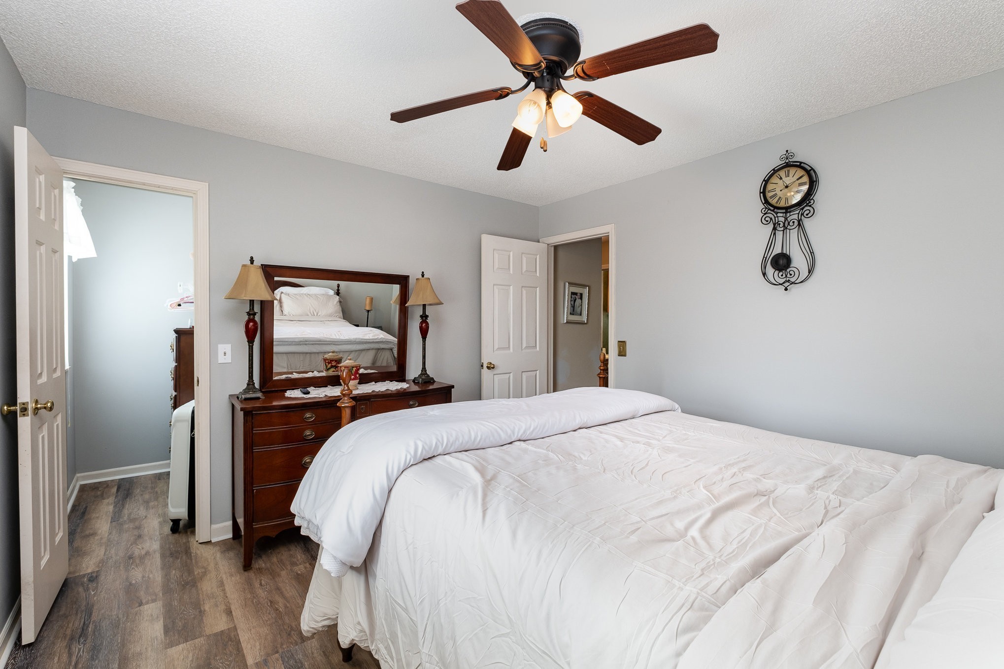 1113 Jacksons Valley Road Hermitage, TN 37076 - Photo 16 of 26 a bedroom with a bed and a chandelier
