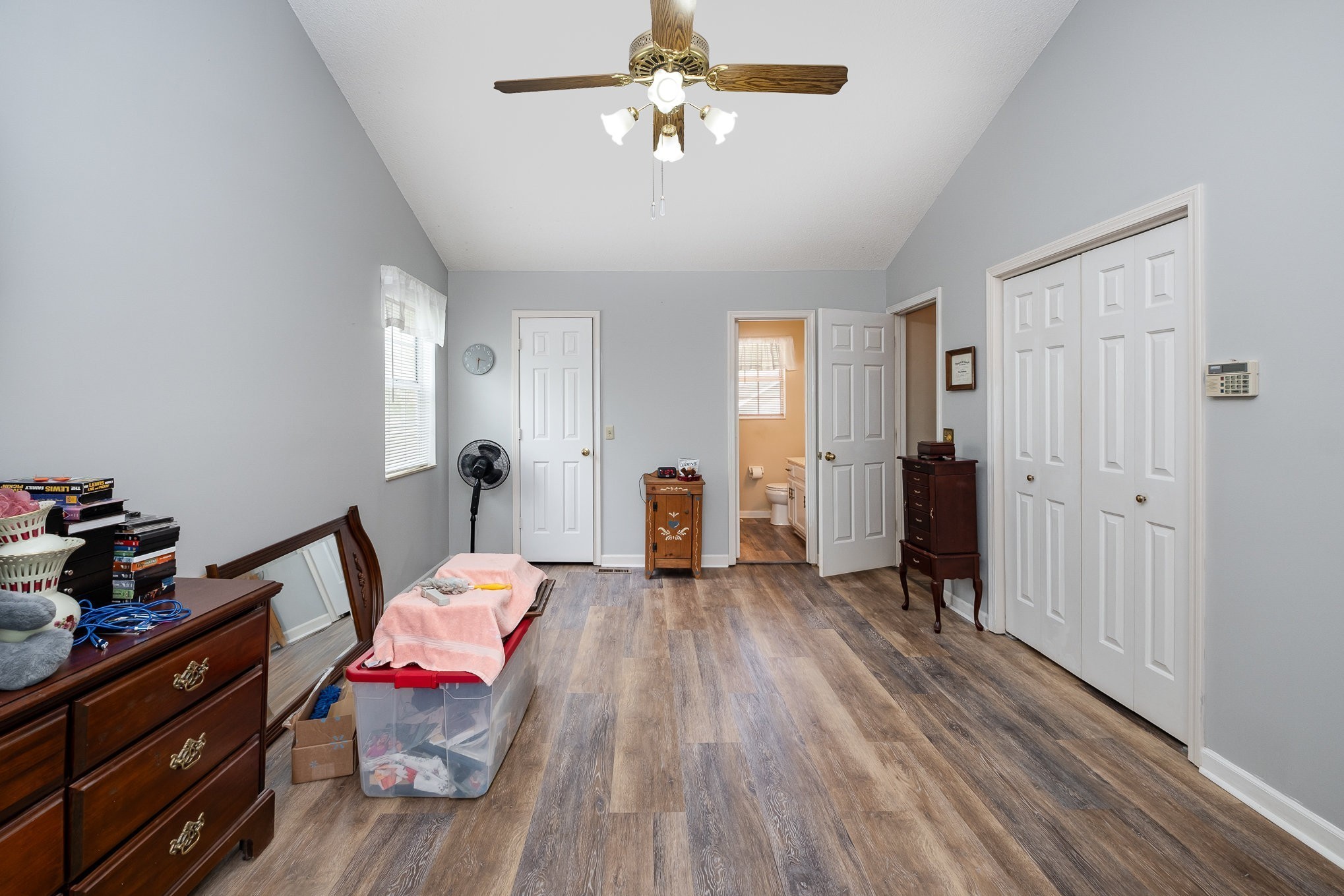 1113 Jacksons Valley Road Hermitage, TN 37076 - Photo 19 of 26 a bedroom with a bed and wooden floors